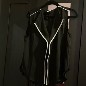 Sleeveless blouse. Perfect for summer, never worn.